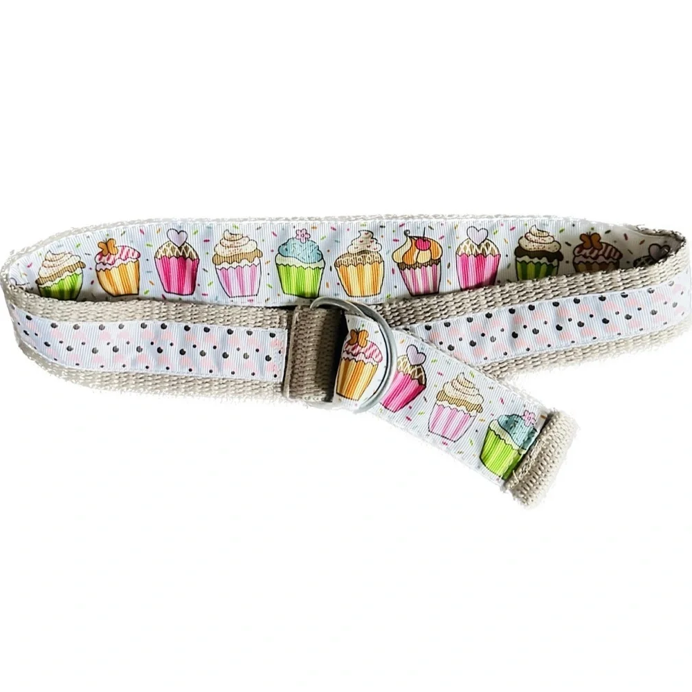 Belt, cupcakes and reverses to hearts on backside Celebrate in style.Adjustable